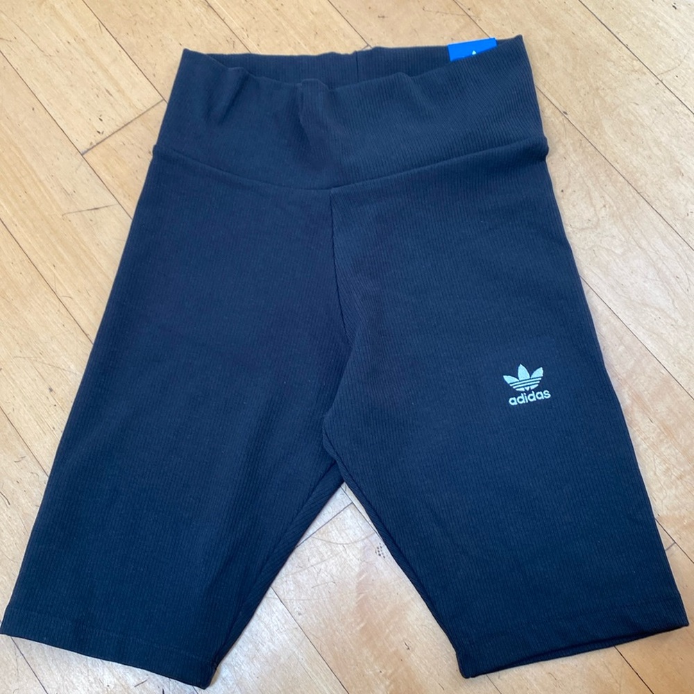 New adidas, s, tight fit, mid rise, full length style shorts.